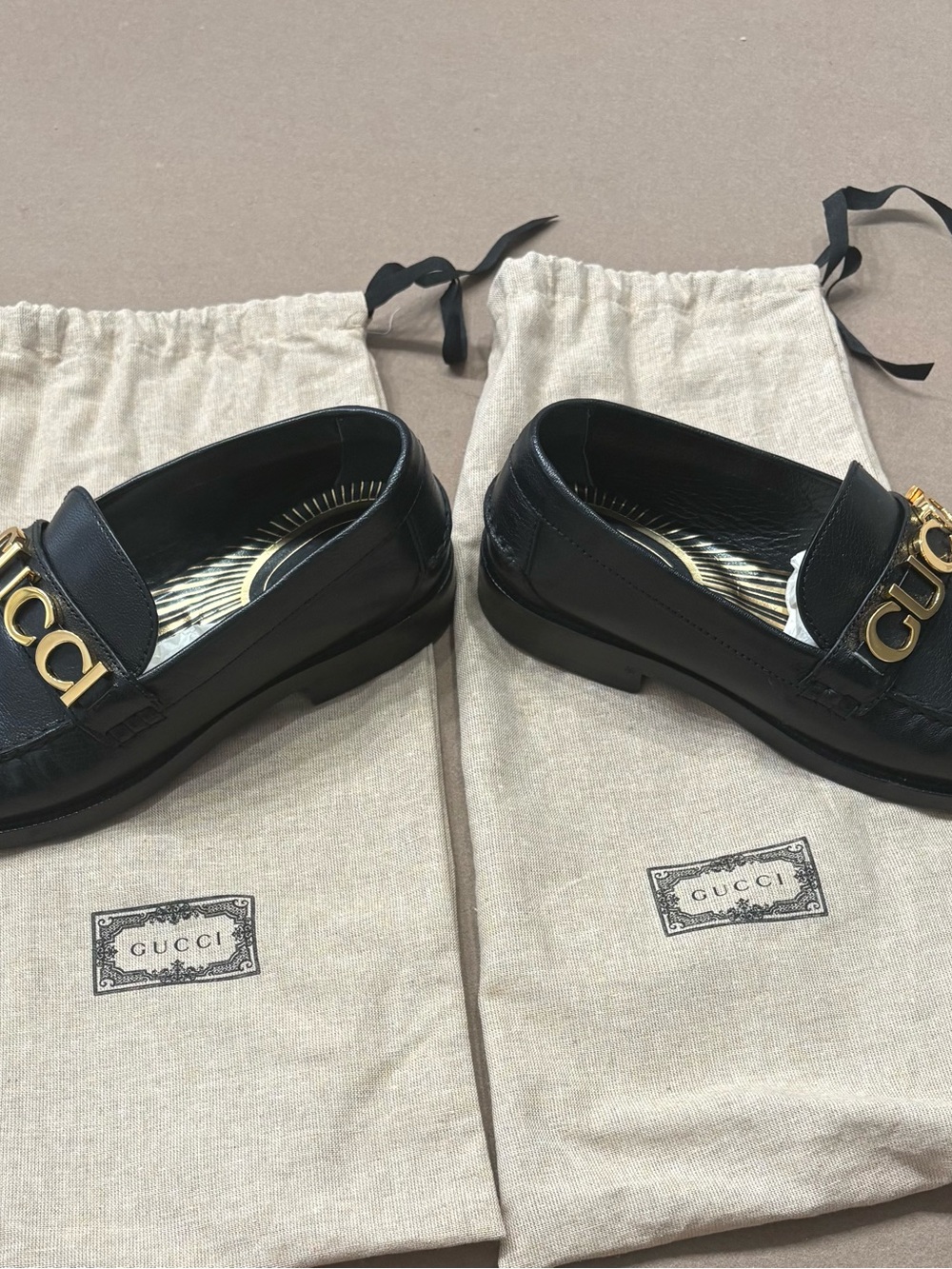 Gucci Black Leather Women’s Loafers with Gold Logo Hardware